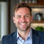 Portrét Ing. Petra Svobody, výživového specialisty s přátelským úsměvem